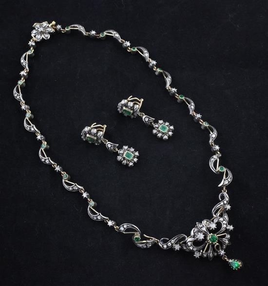 A 19th century gold and silver, rose cut diamond and emerald set drop necklace and a pair of similar earrings, necklace 18in.